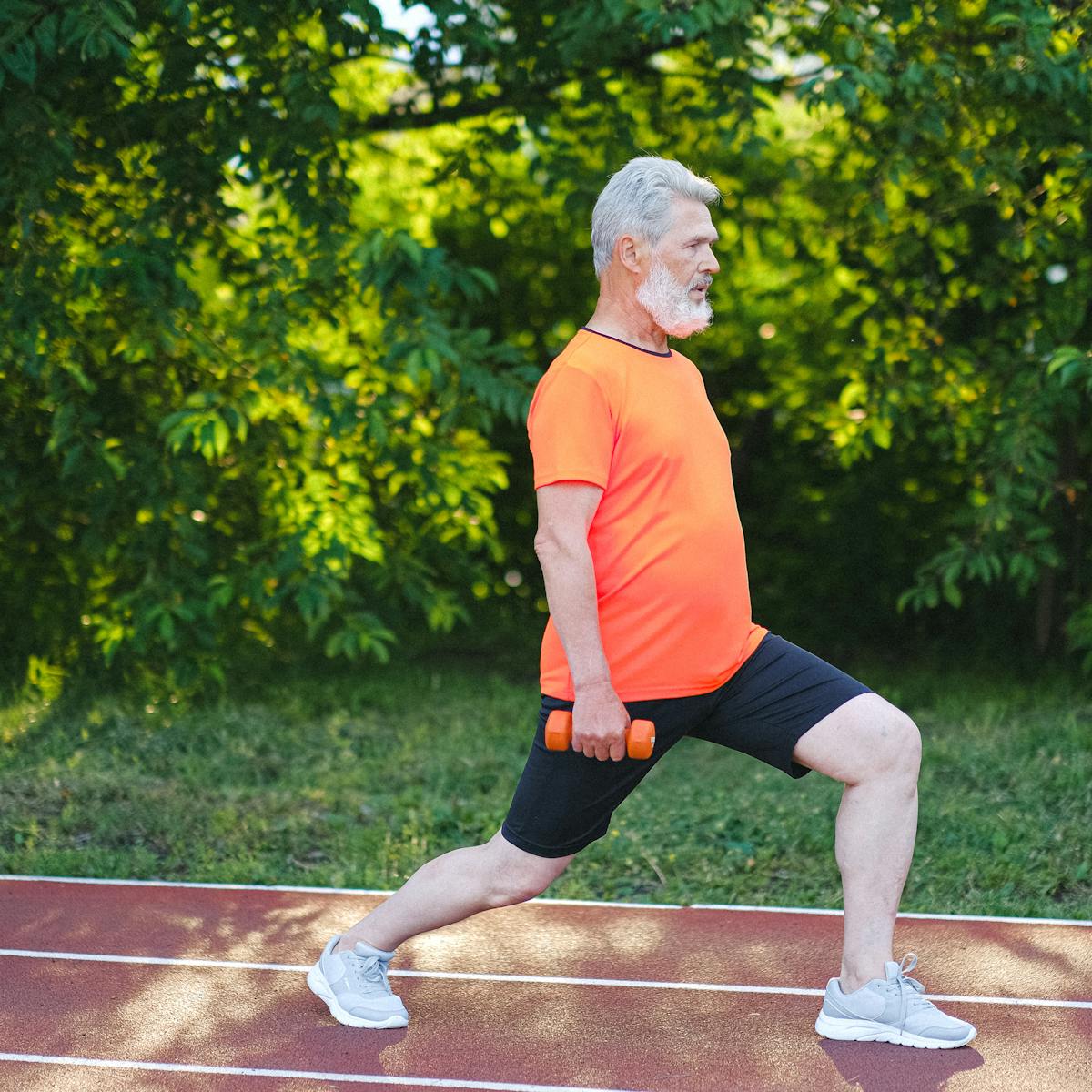 An active older man exercising, representing the mobility and preventive goals of ongoing primary care.